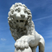 Carrara marble lion guarding the Bridge of Lions (replica of those in the Loggia dei Lanzi in Florence Italy)